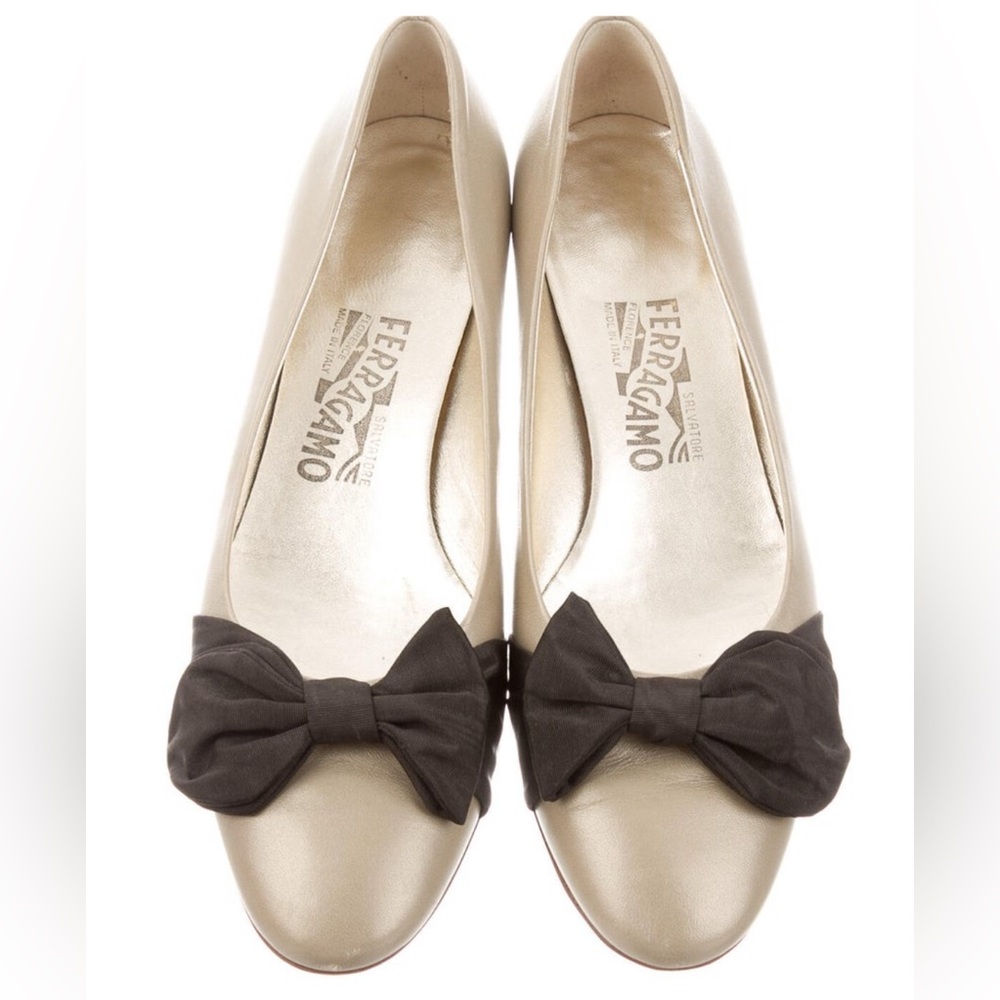 Salvatore Ferragamo Gold and Black Flats with Bow